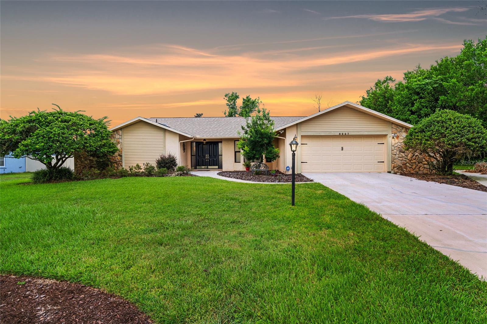 Front of home and large front yard