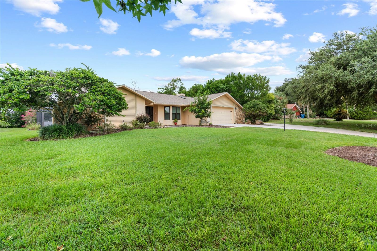 Front of home and large front yard