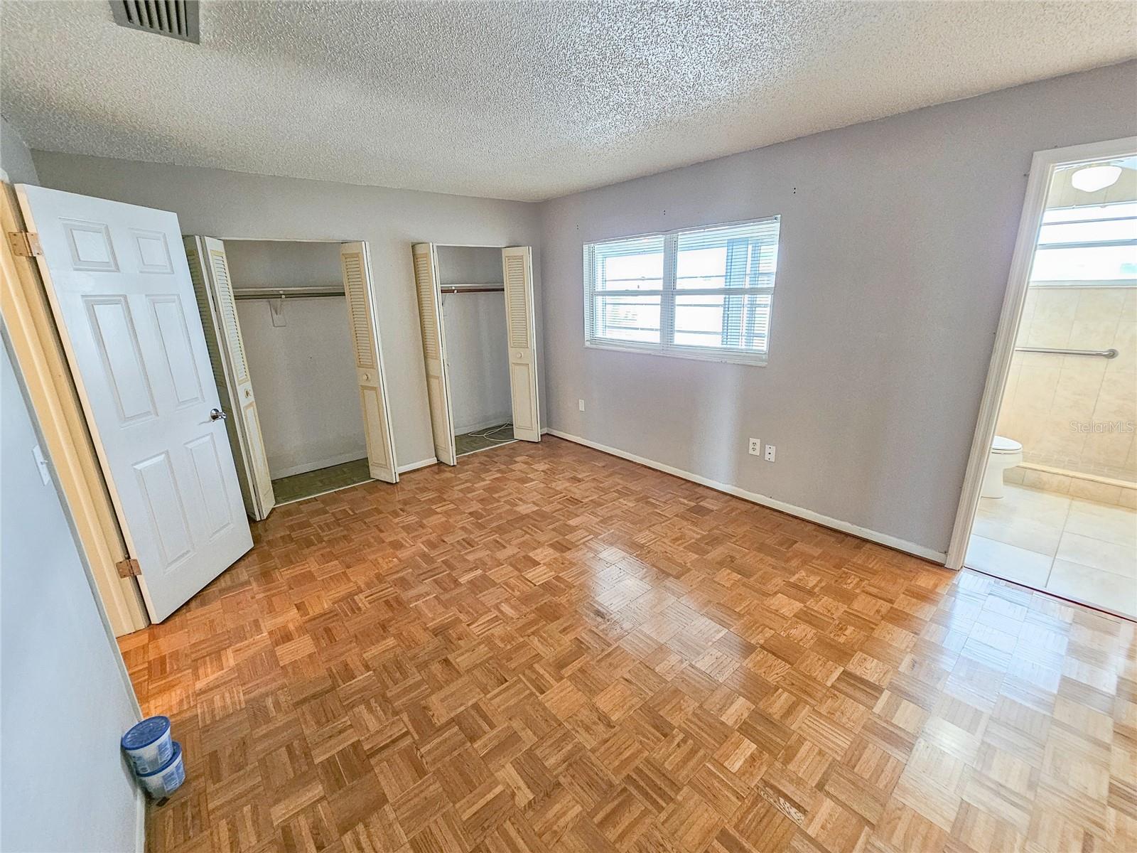 Primary Bedroom w/ Pass thru Closet.