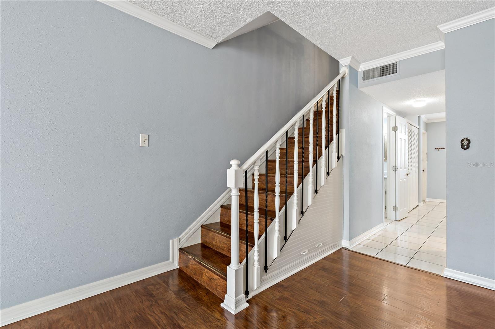 Wooden Stairs lead to Bedrooms - Under Stair Storage