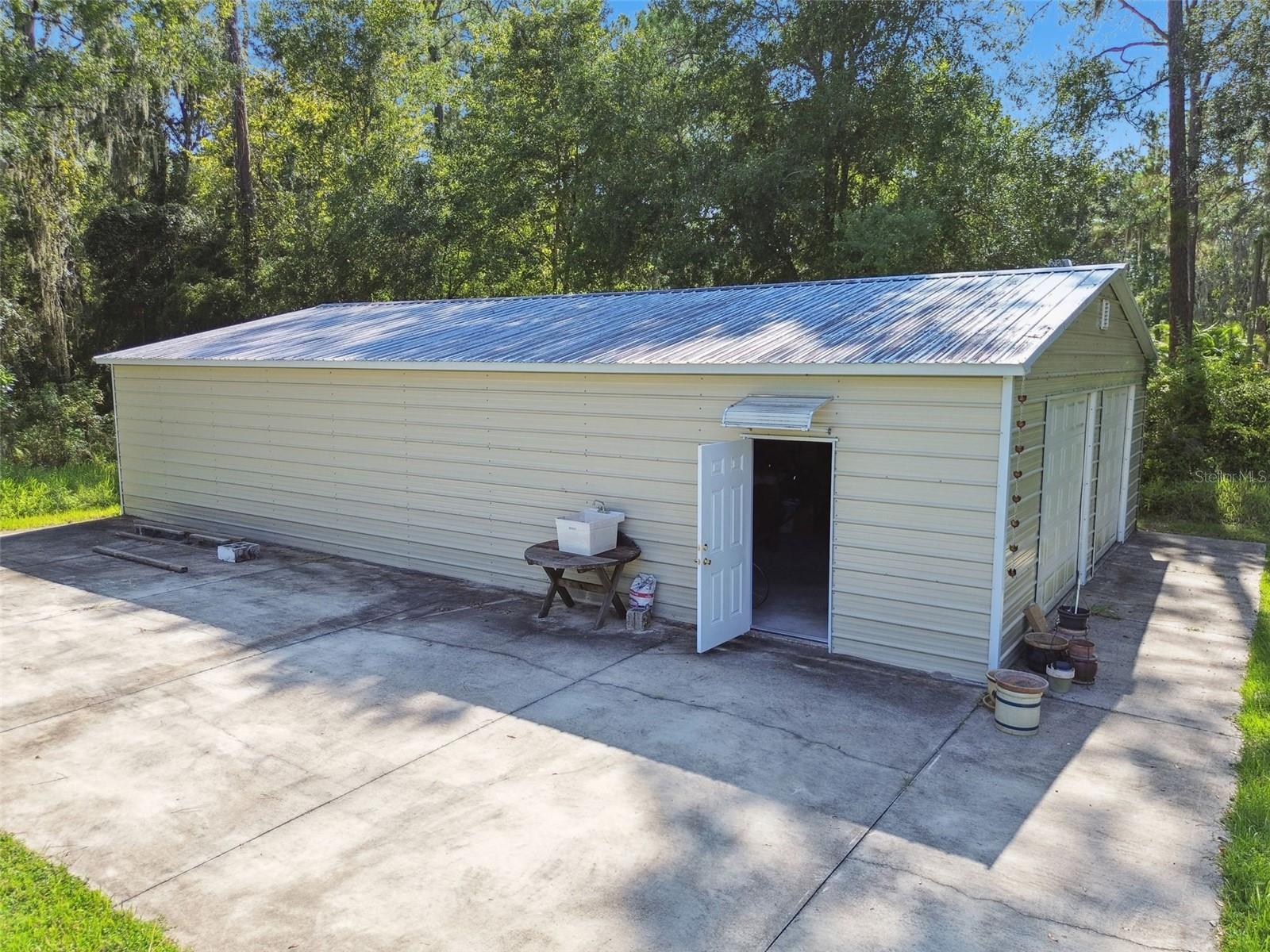 Metal Building with attached RV slab & wash station