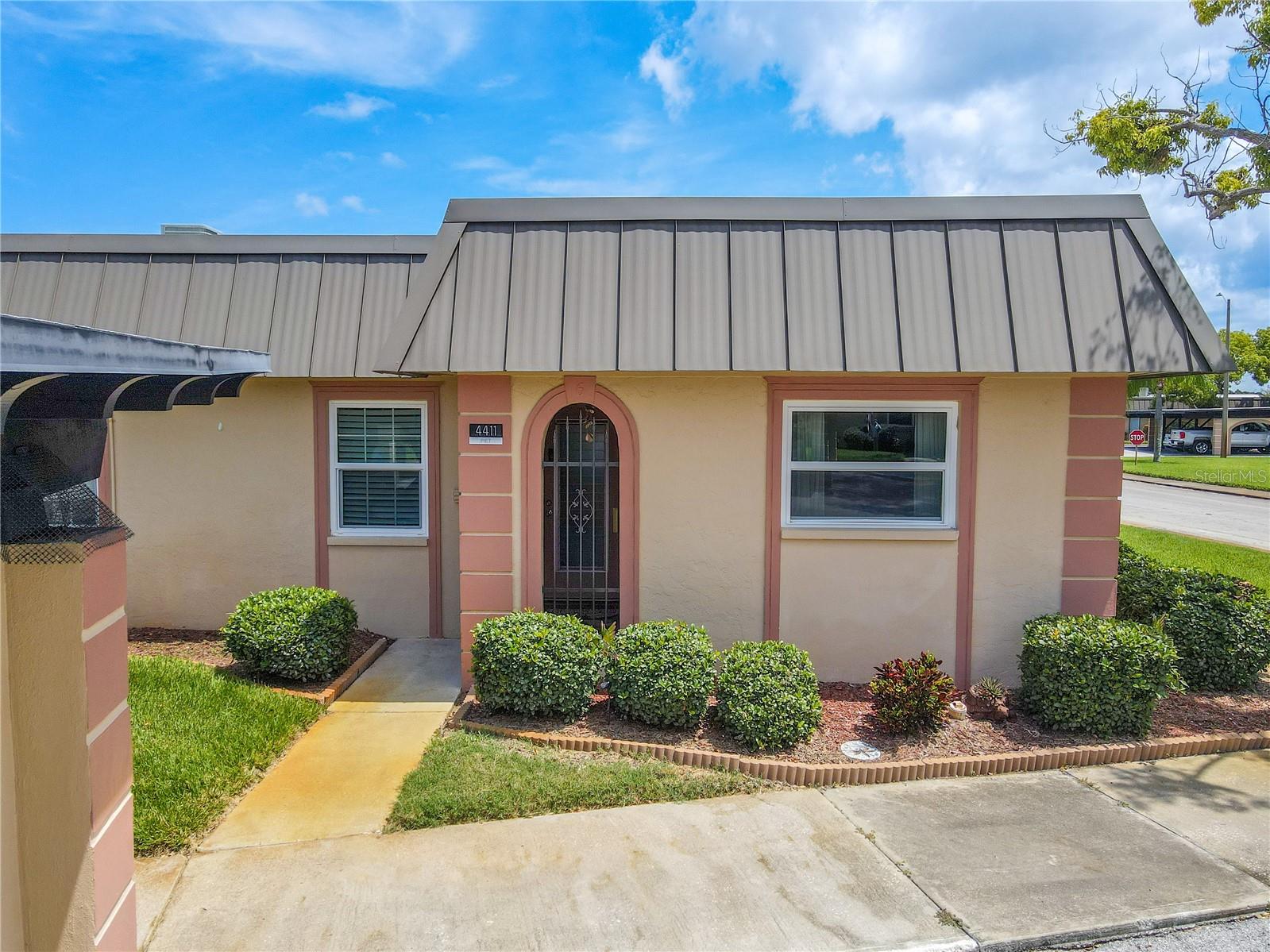 TURN KEY, 2 Bedroom, 2 Bath, End Unit with Carport Located in the Gardens in Beacon Square