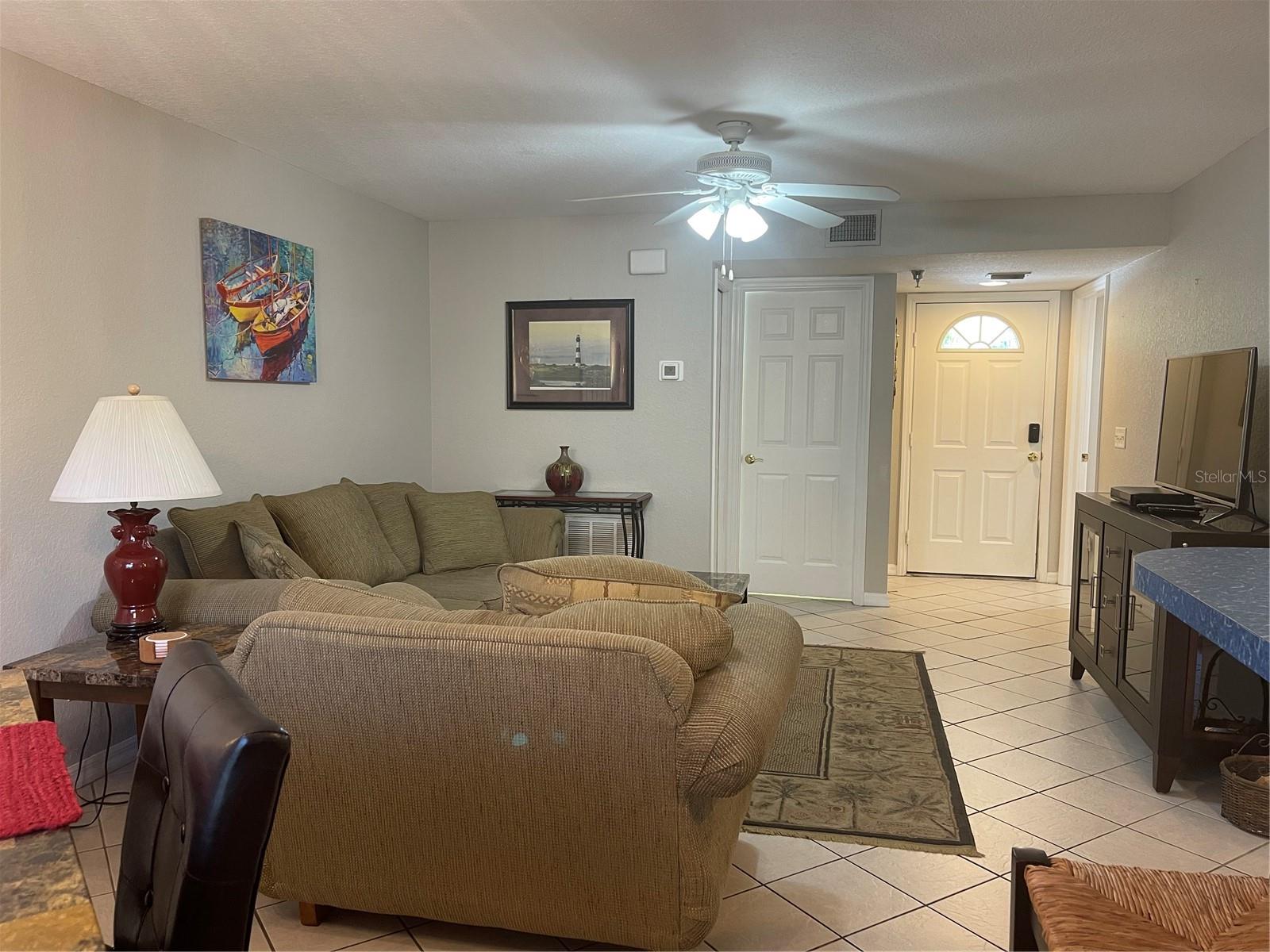 The air handler is in the closet to the right from the front door.