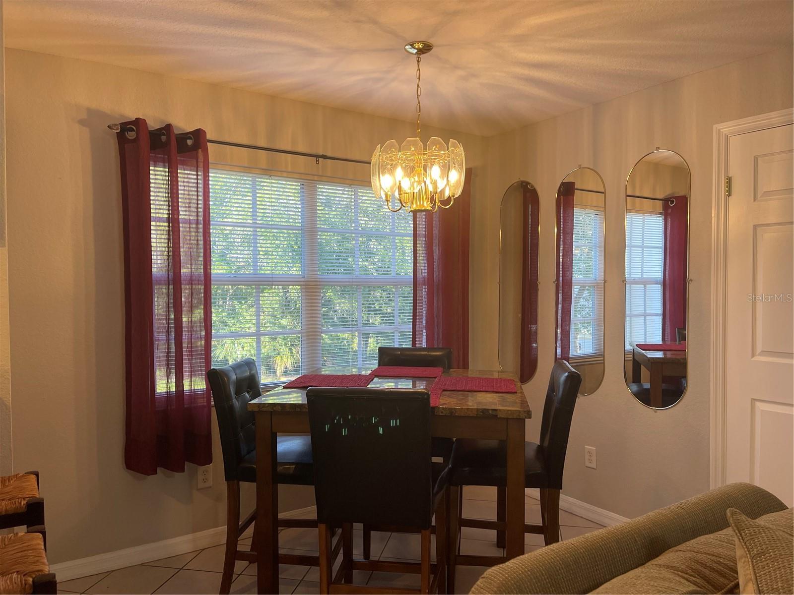 Dining area overlooks the pond