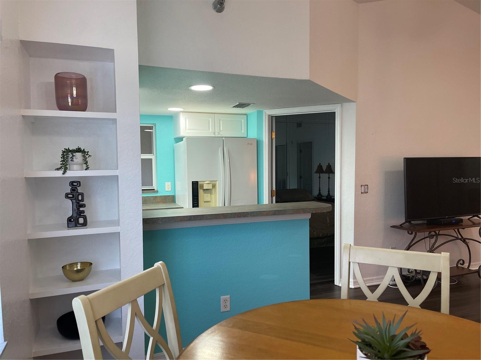 Upgraded shelving nook in dining room