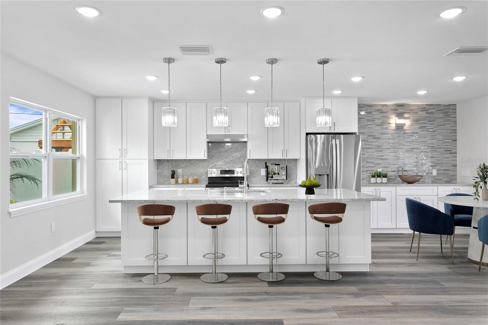 Virtually staged kitchen with breakfast bar