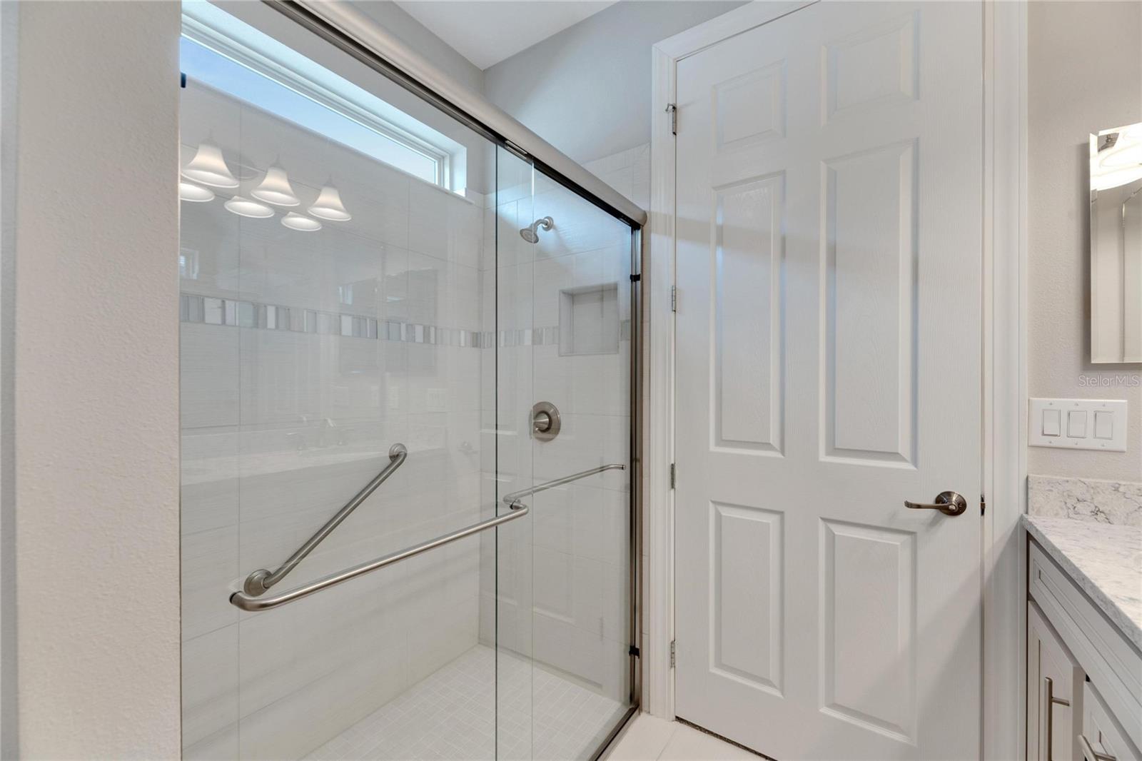 primary bathroom with walk in shower