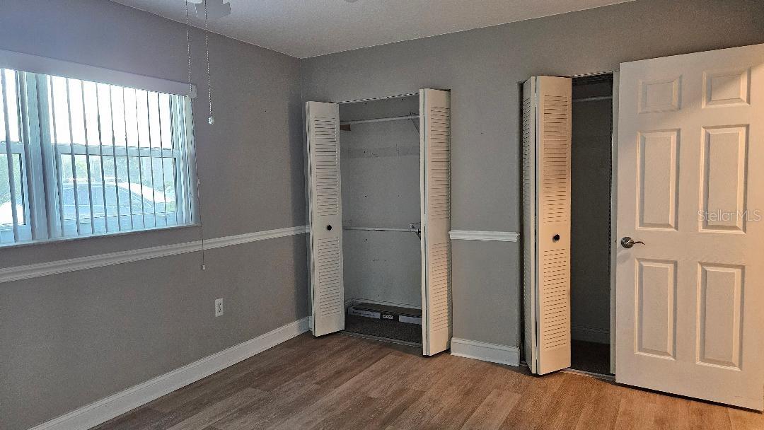 Bedroom with large closets