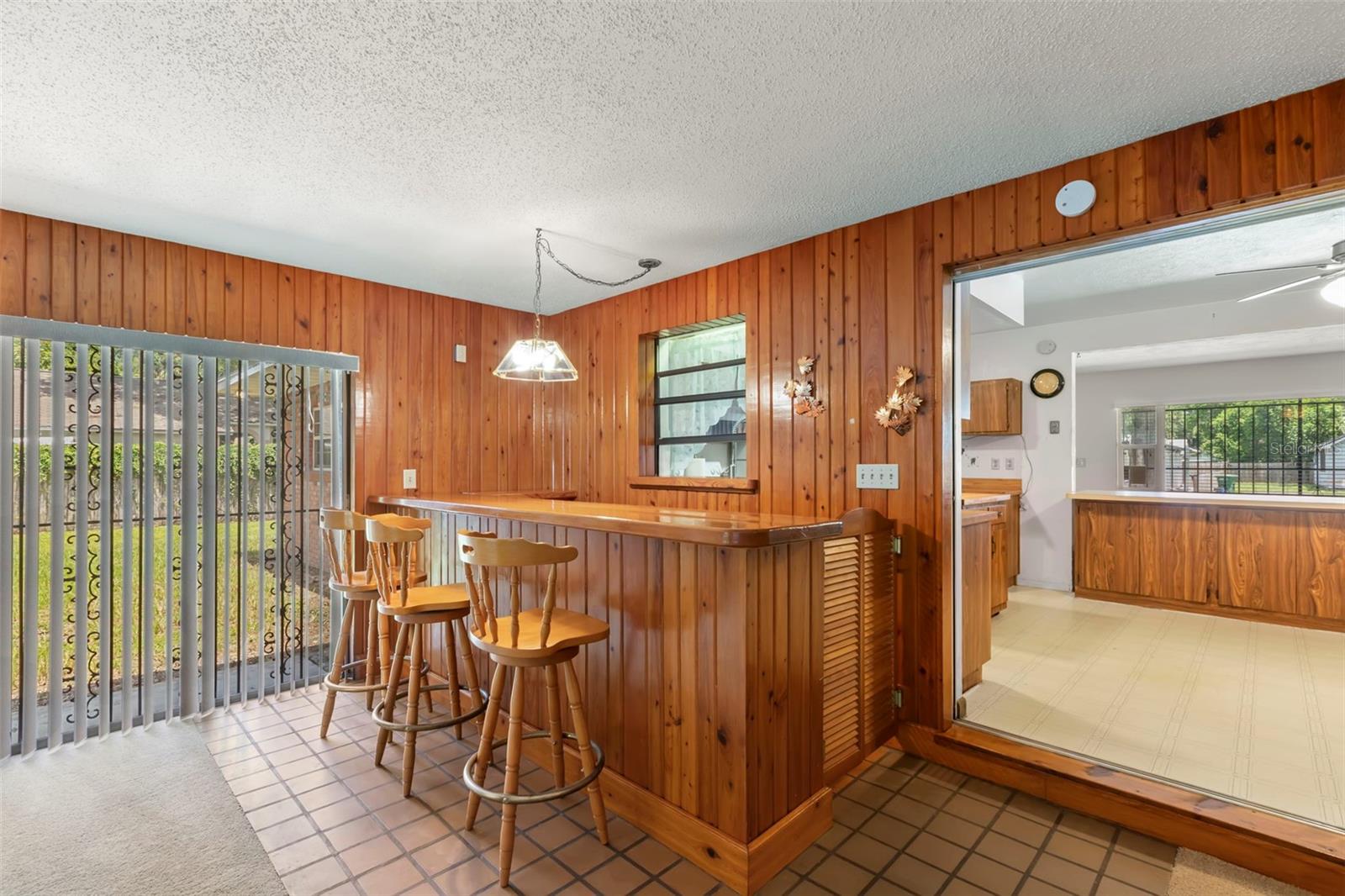 Family Room with Custom Built In Bar