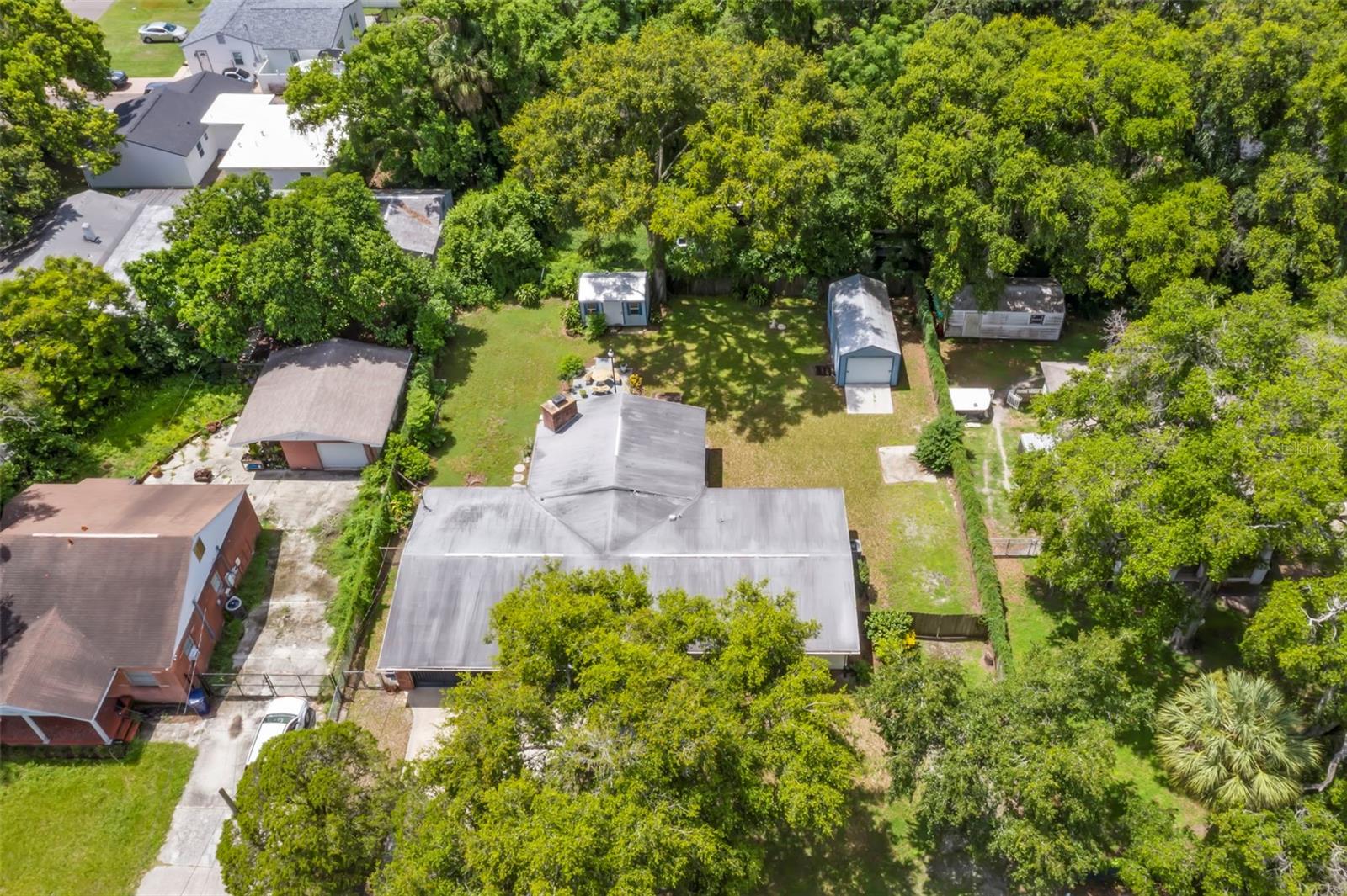 Aerial showcasing oversized lot.