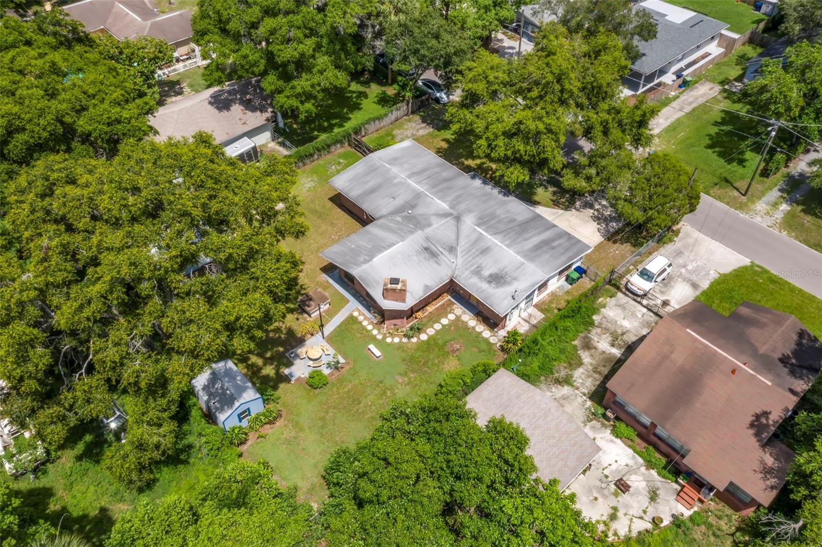 Aerial showcasing oversized lot.