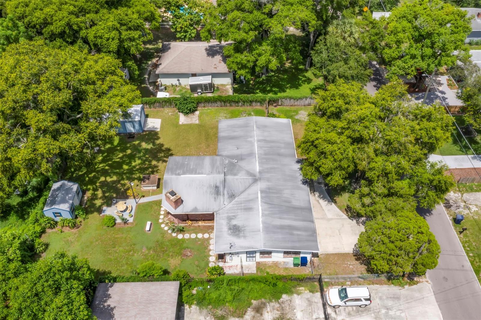 Aerial showcasing oversized lot.