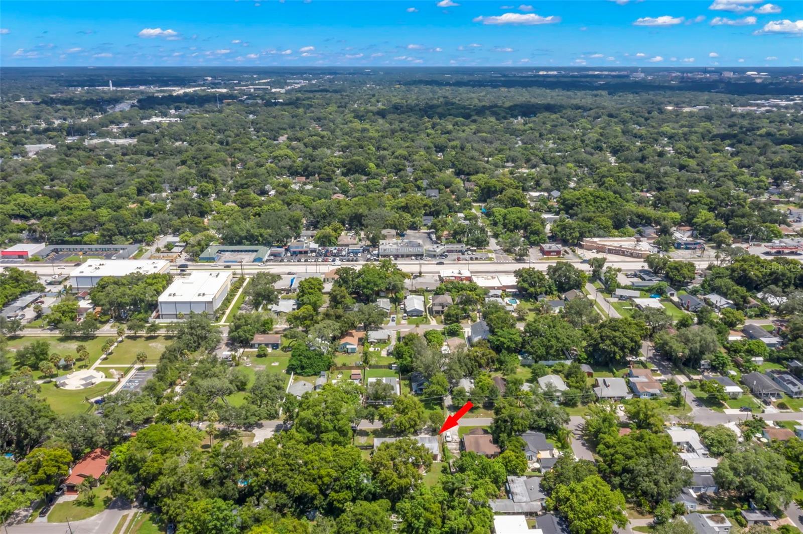 Aerial showcasing oversized lot.