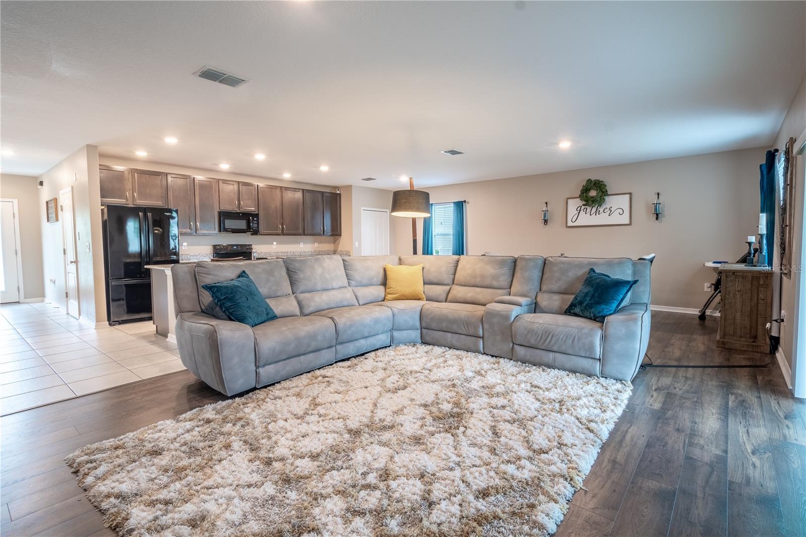 The open floor plan is ideal for entertaining and family gatherings.