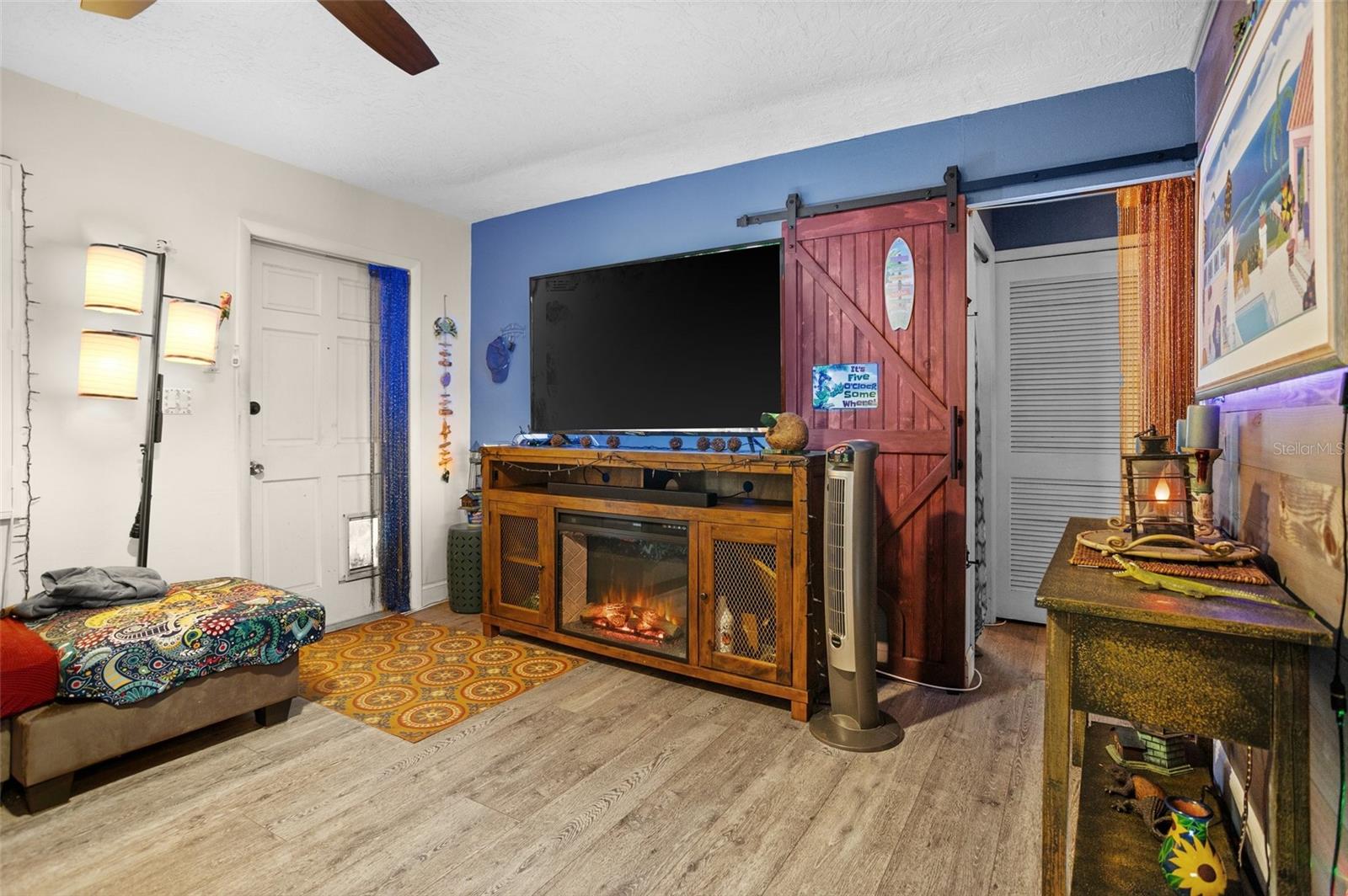 LIVING ROOM WITH NEWER FLOORING