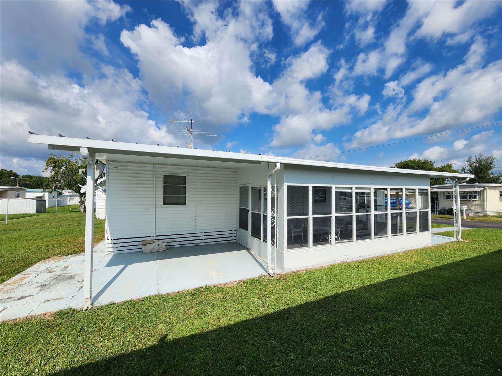 East side of home & Florida room.