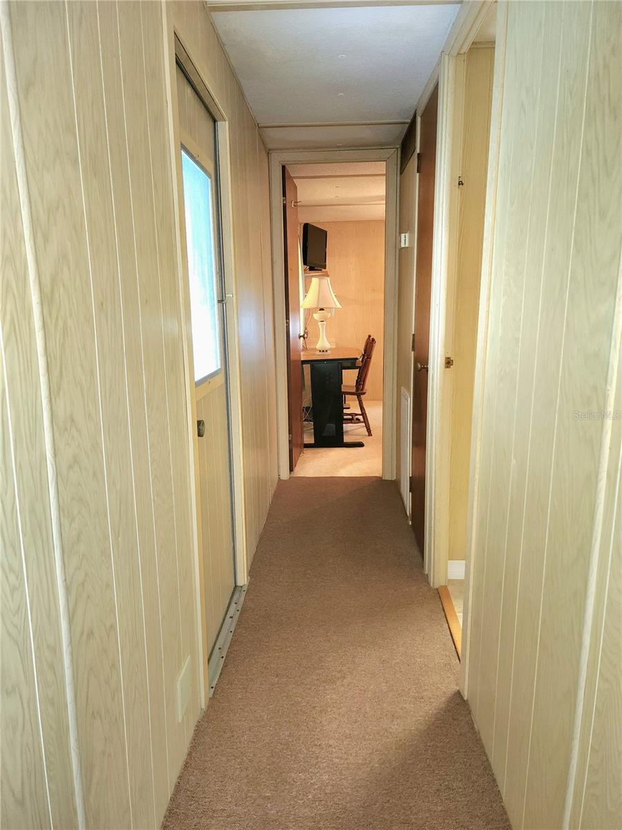 Hallway with closet.