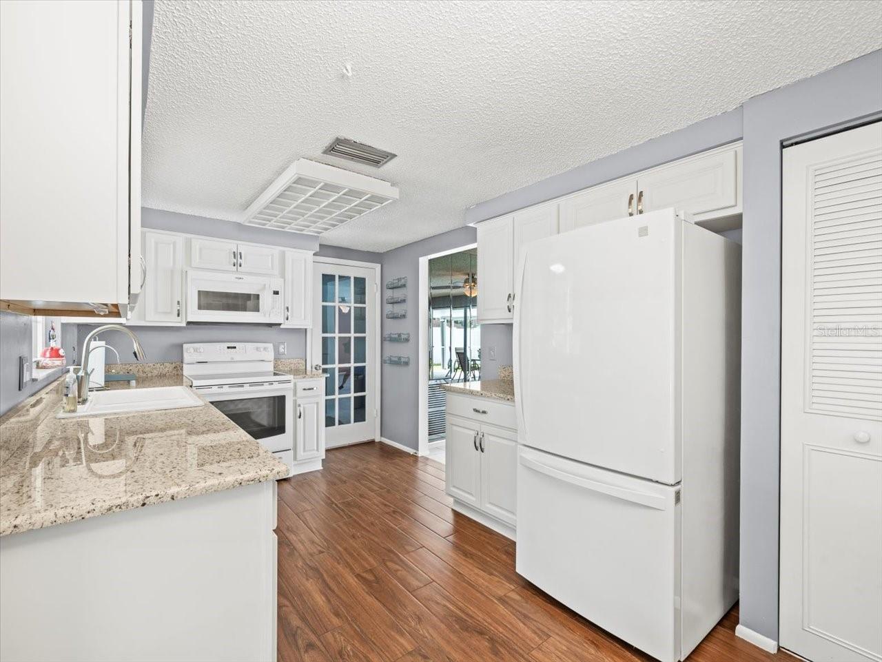 Kitchen with view of garage door