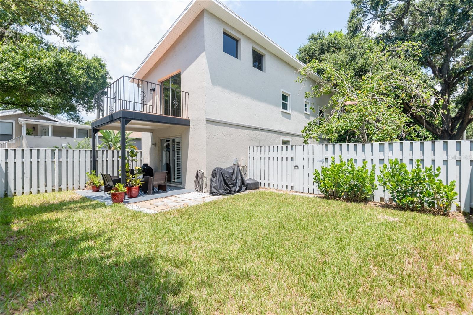 Private fenced backyard