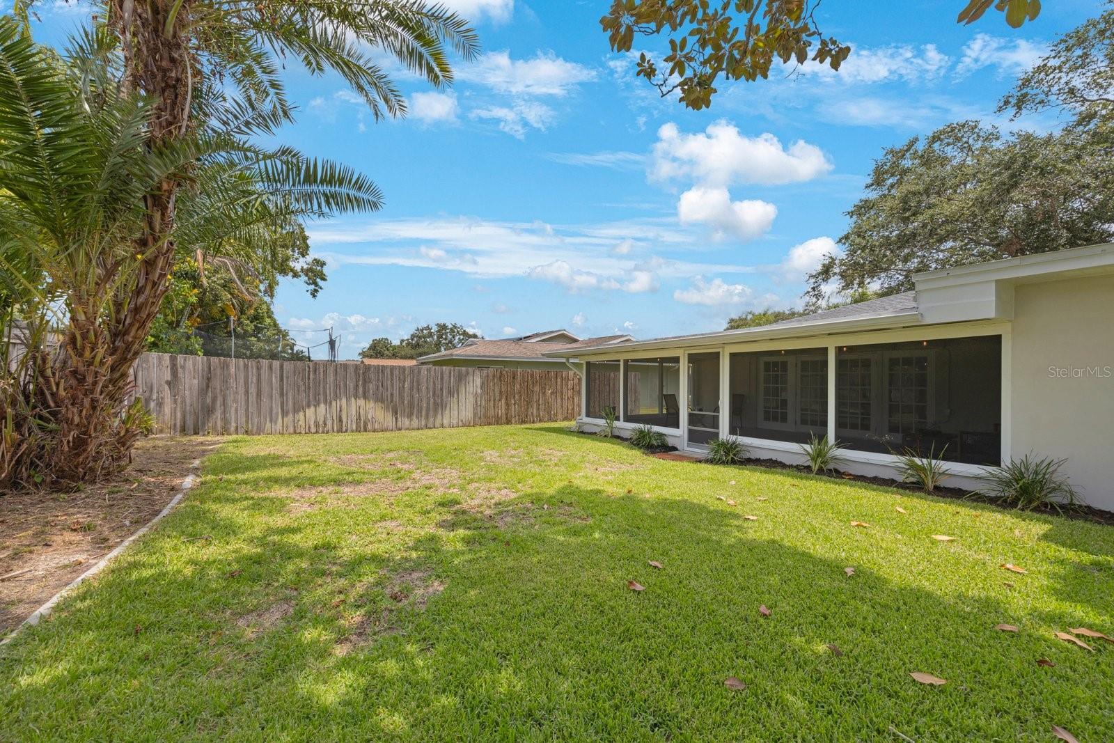 Lots of room for play or pool in the sunny backyard!