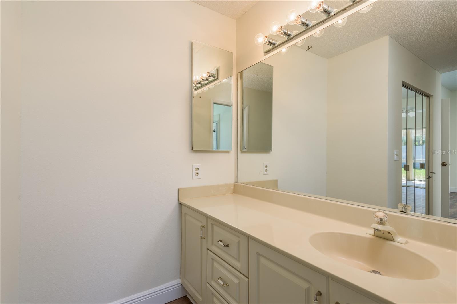 Primary bath vanity with medicine cabinet