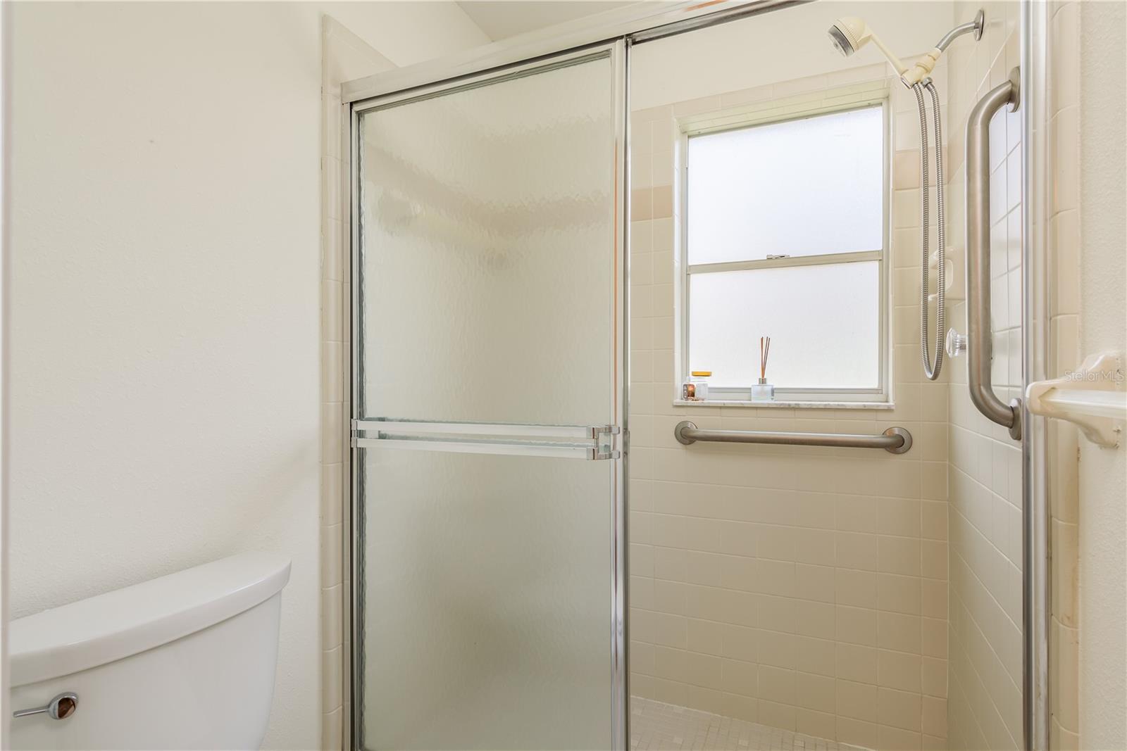 Primary water closet with shower