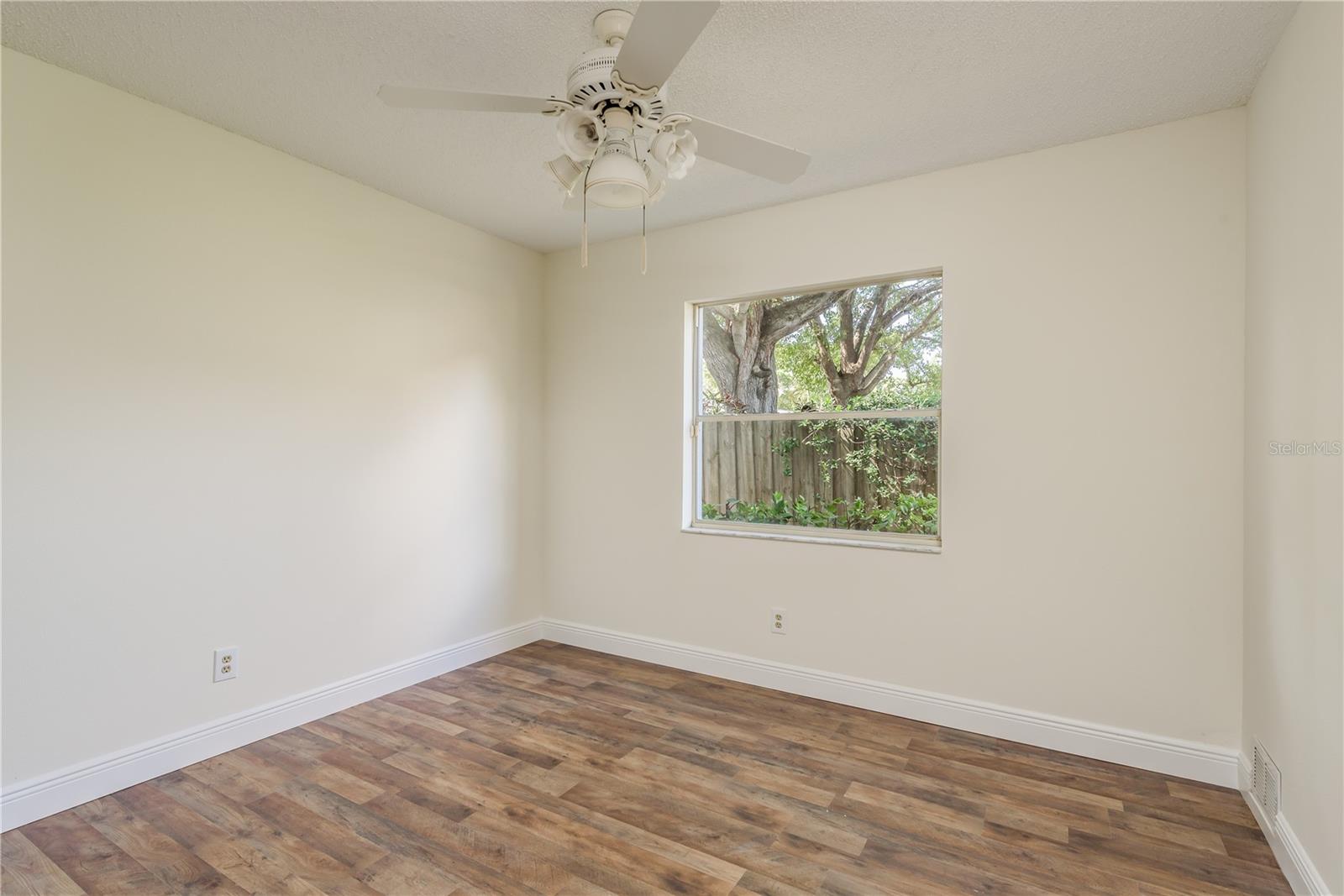 Bedroom 3 with ceiling fan