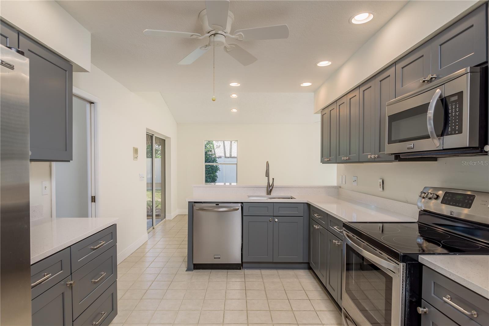 Kitchen entrance from hallway through to Family room