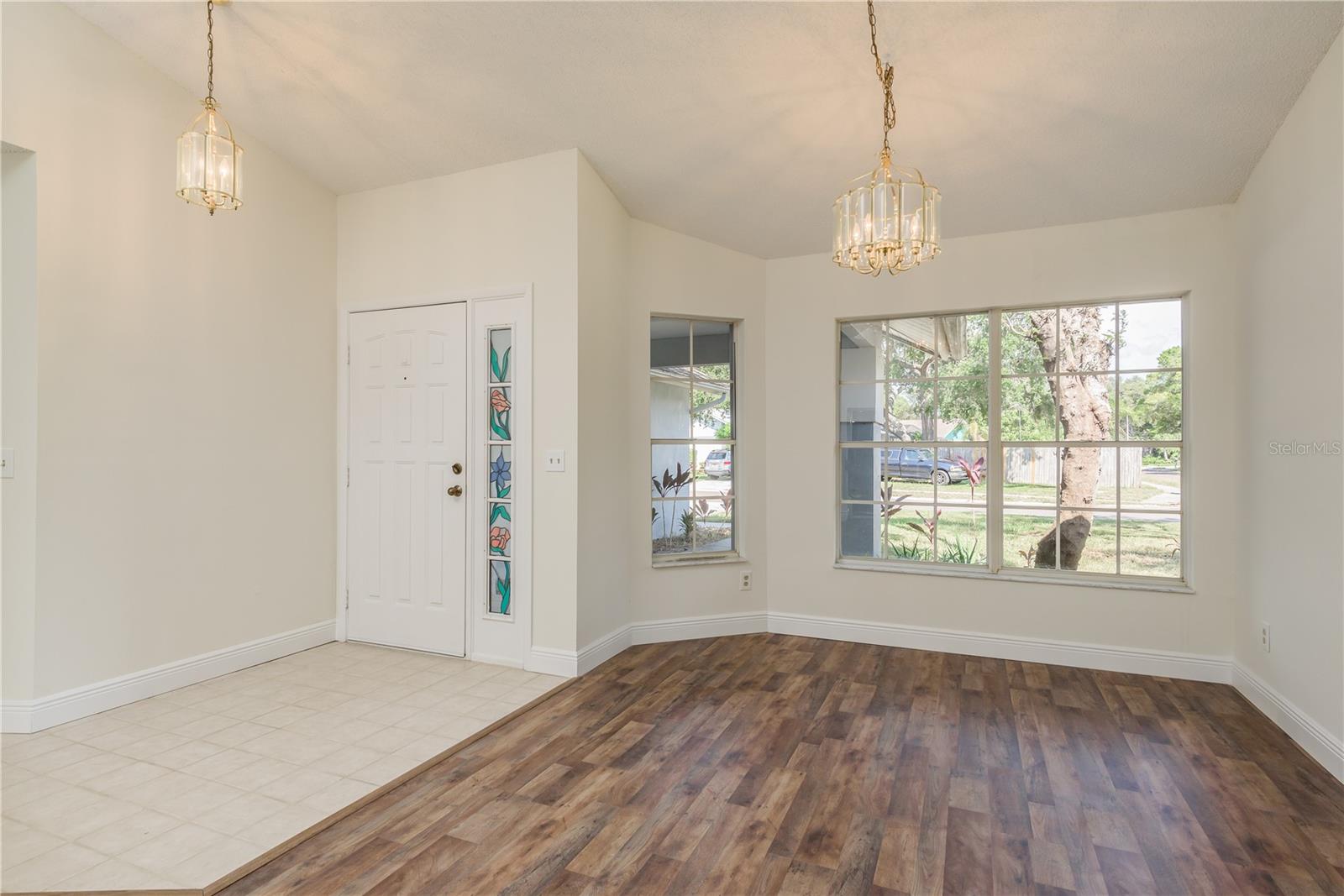 View of Great room of front door and windows