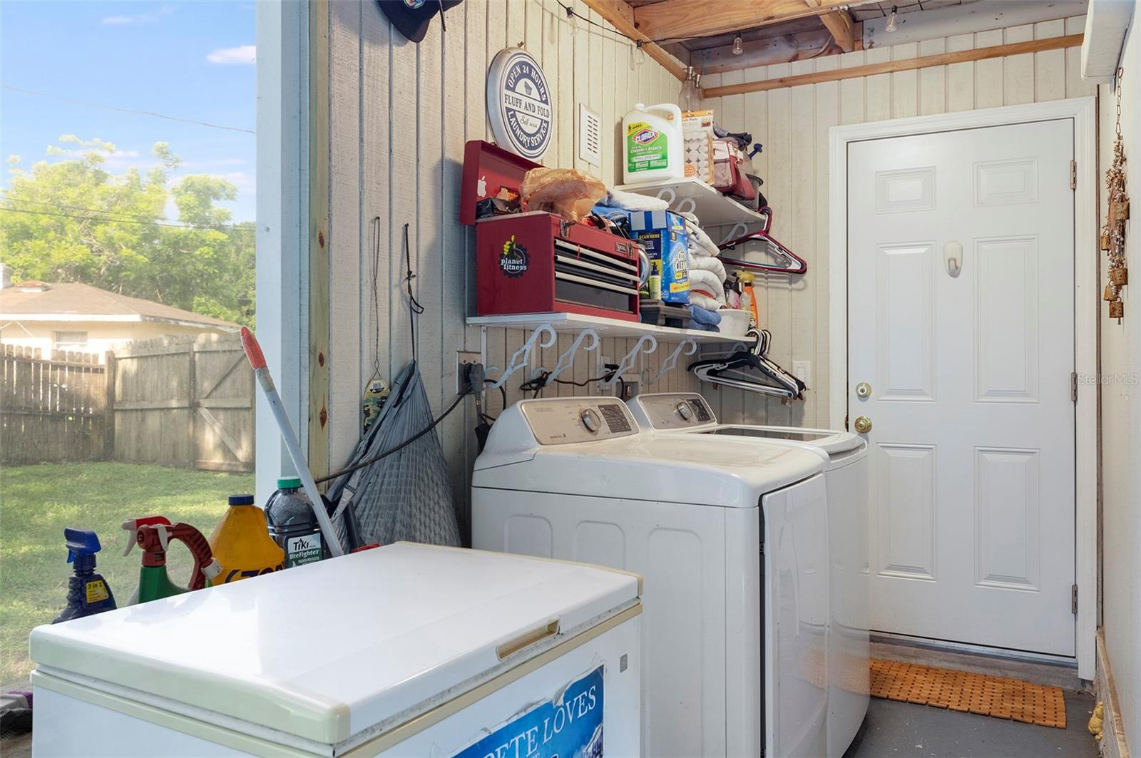 Washer and Dryer in Covered Porch Area