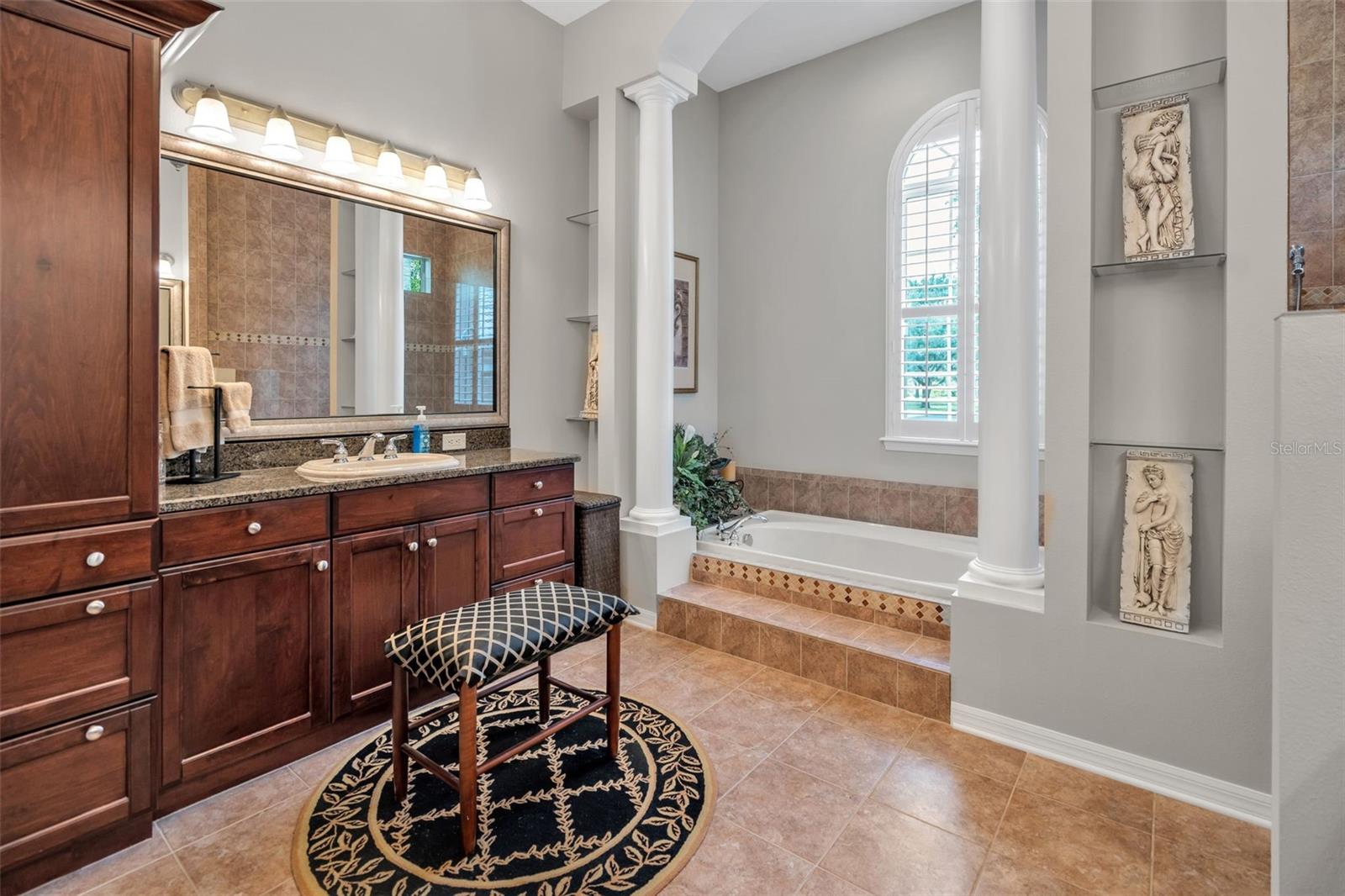 Elevated soaking tub & second vanity area