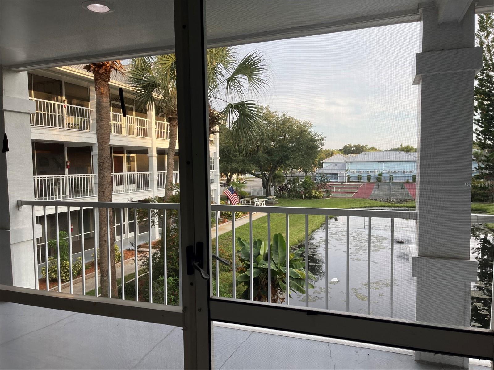 The blue building seen at a distance is the hotel of Paradise Lakes Resort where the multitude of pools can be found.