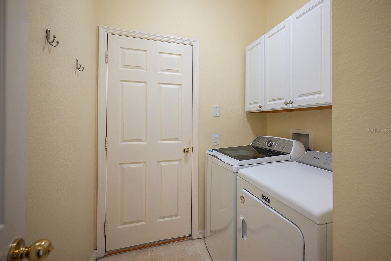 Laundry room with walk-out to garage