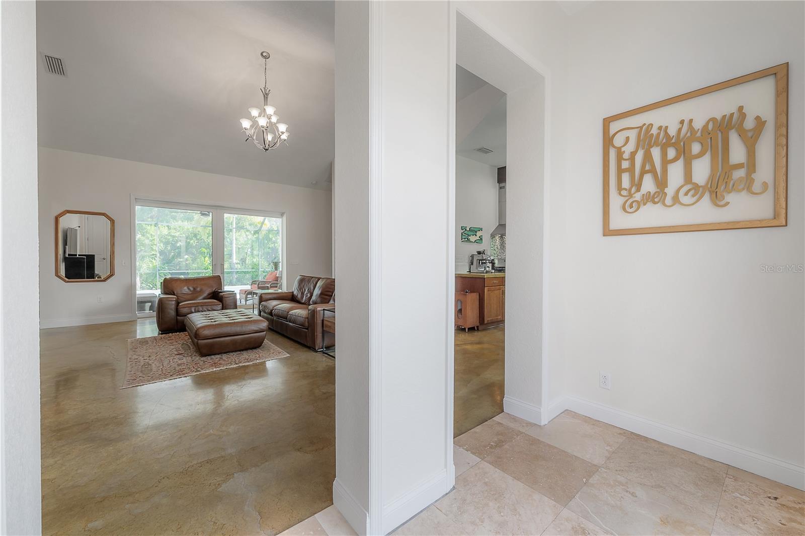 Foyer with travertine flooring