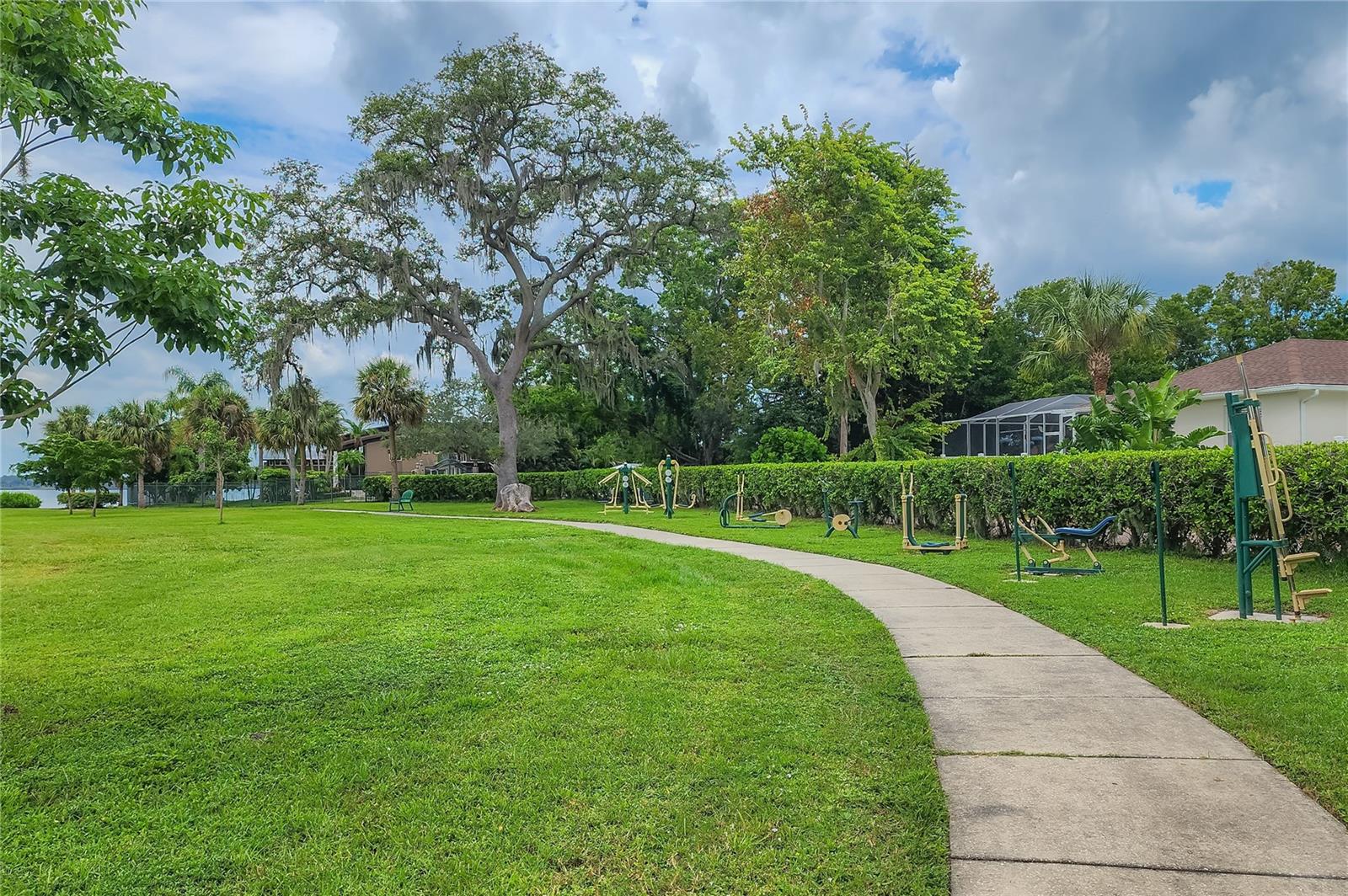 Nearby Veterans Memorial Park walking path and workout equipment