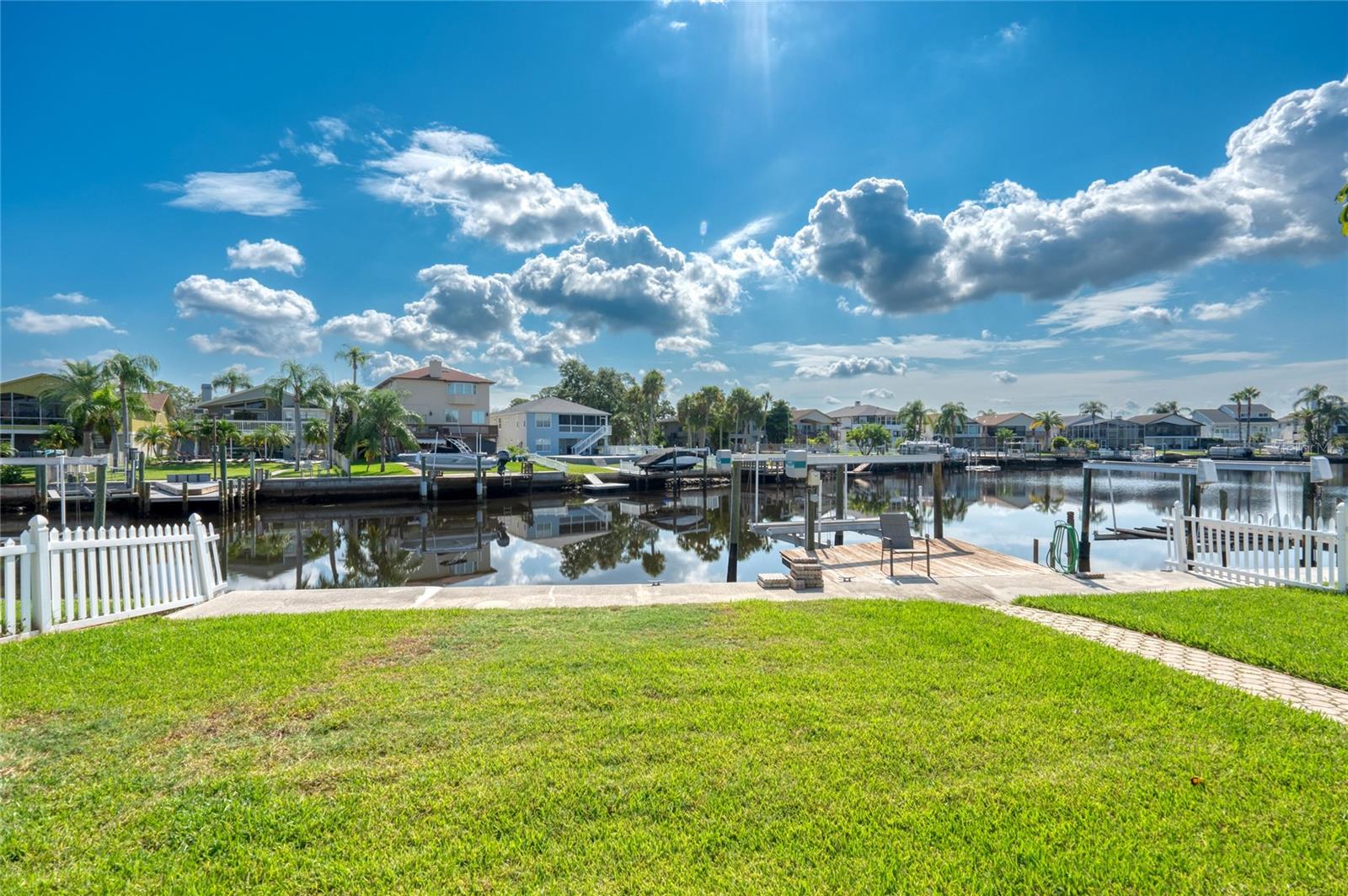 This 10,000 lb Boat Lift was installed in 2018, Seawall cap was just redone