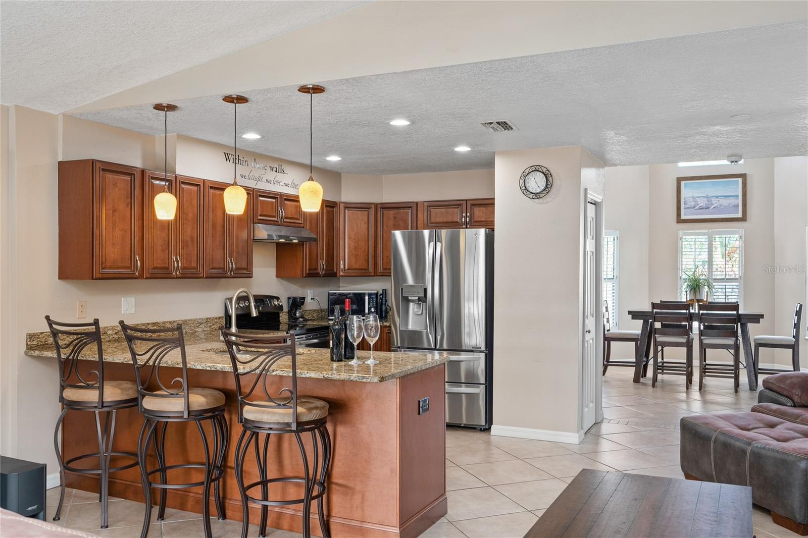 Wood cabinets, granite countertops and stainless steel appliances