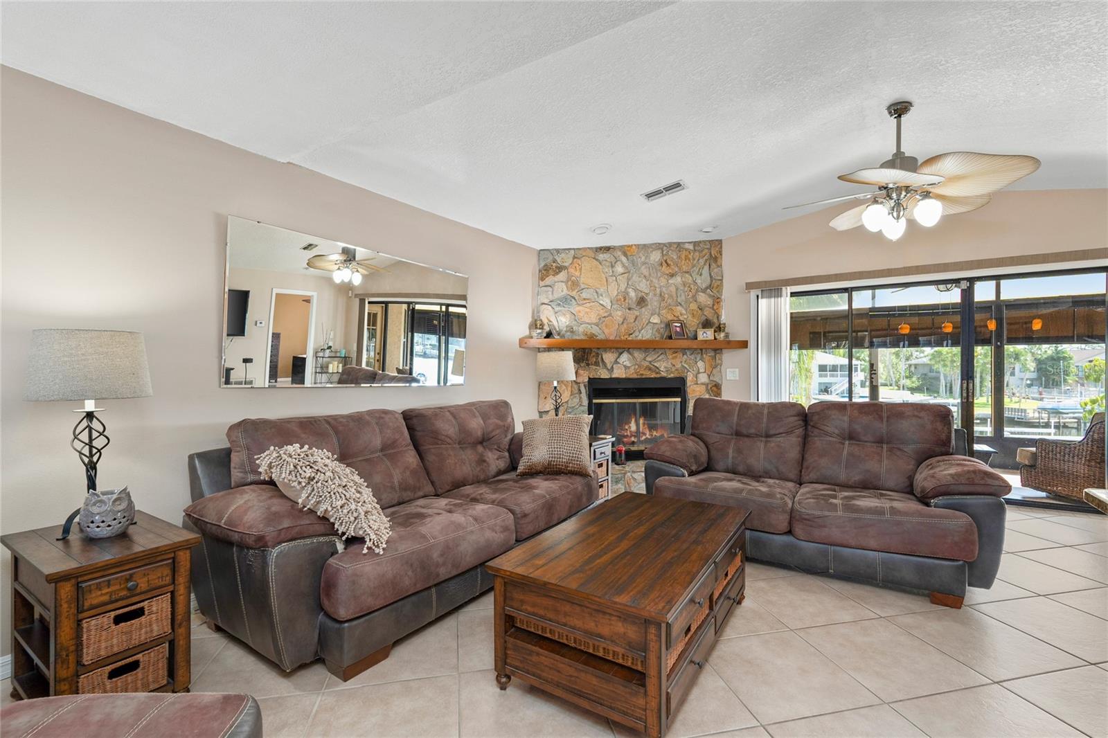 Living room with a wood burning fireplace