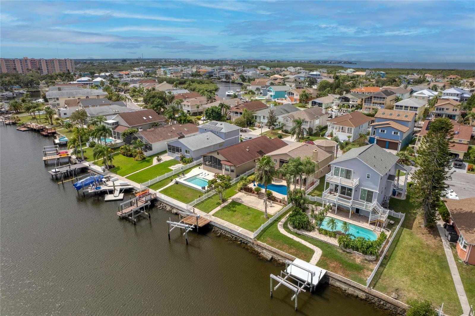 This beautiful home is located on a turn basin with minimal canal traffic