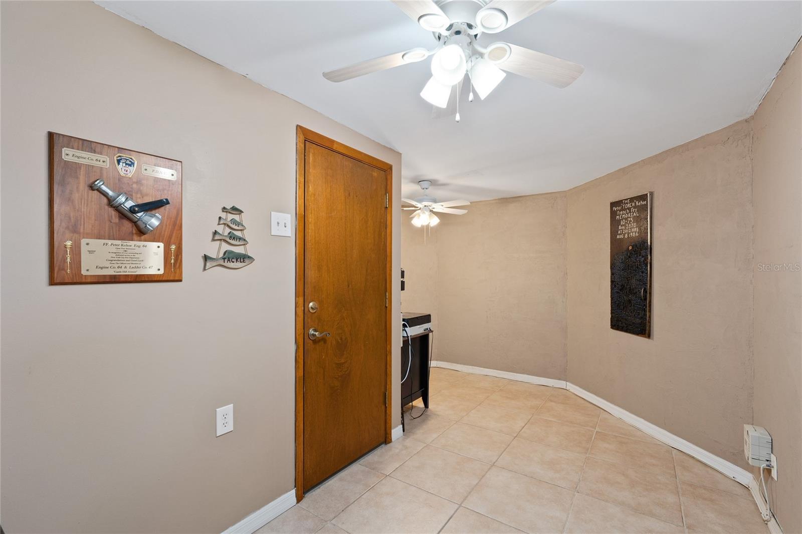 The entire 1st Floor of this home is tiled too