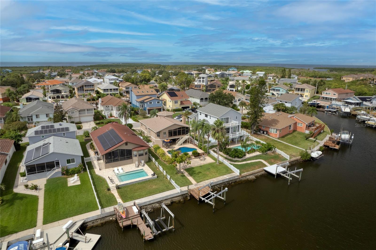 Take in this gorgeous water view from the screened in Florida Room