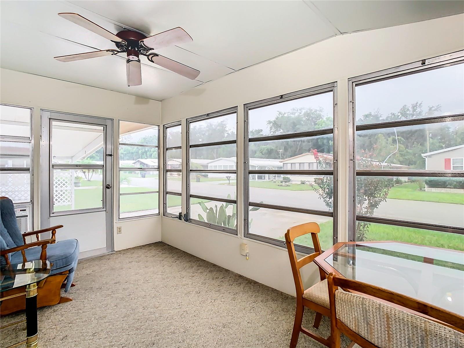 Sunroom with window AC.