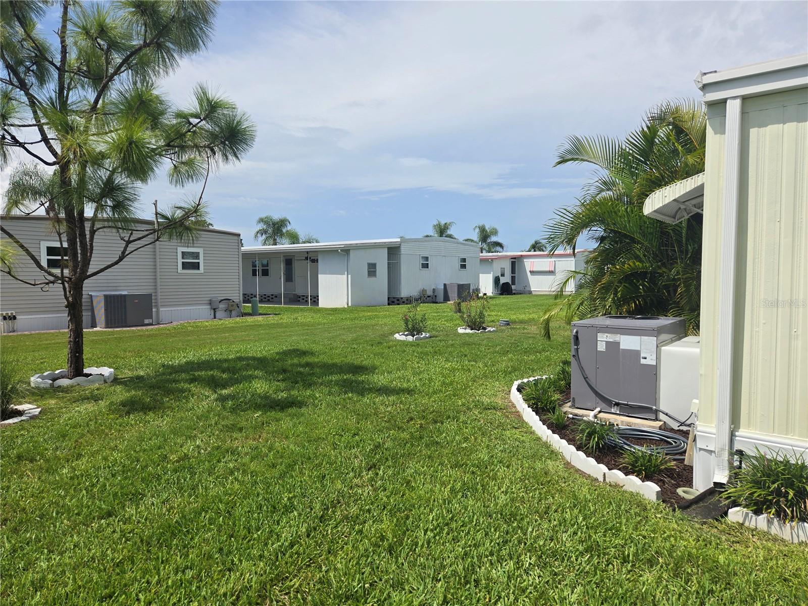 The community office is the neighbor behind this home w/ clubhouse, pool, amenities across the street