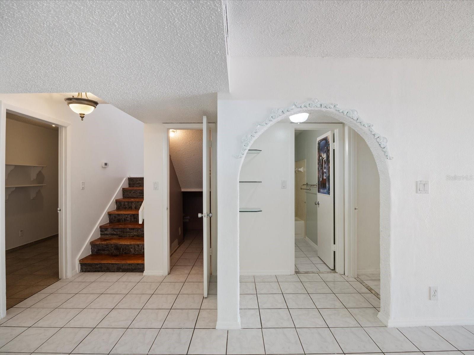 Looking towards hallway leading to full bathroom & master bedroom