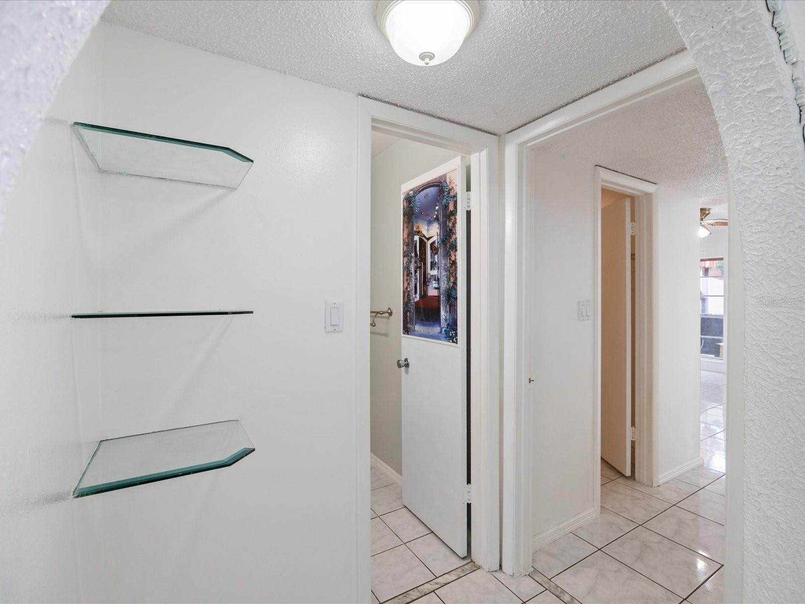 Hallway to bathroom and master bedroom