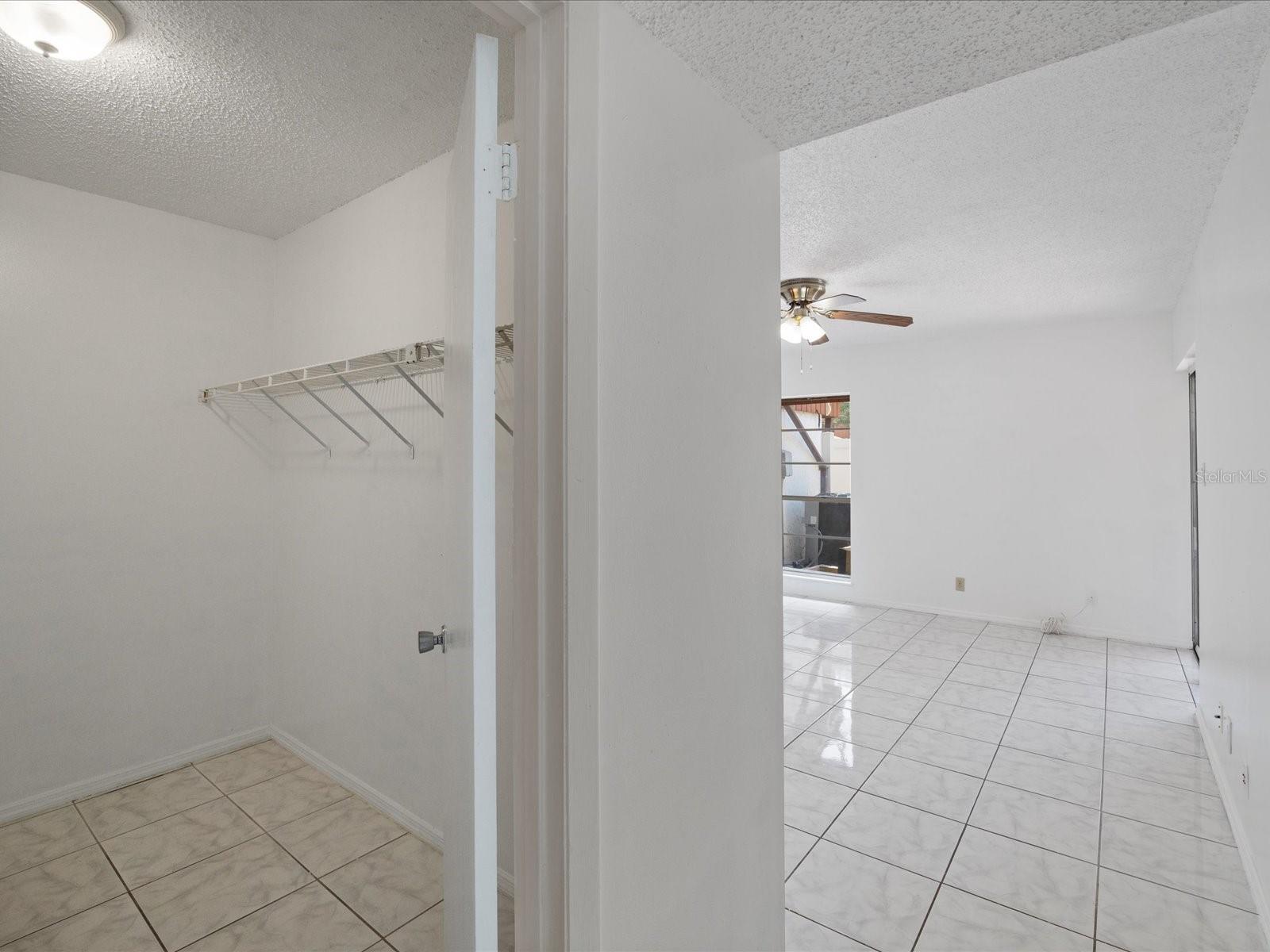 Entrance to master bedroom w/ walk-in closet