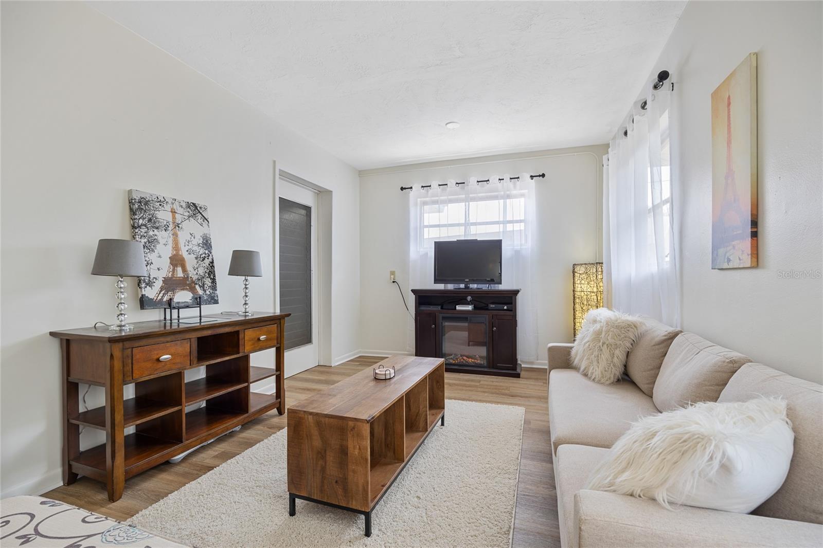 This family room space is bright and yet delightfully cozy.