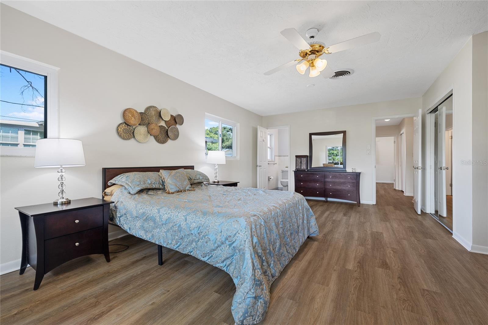 The Master Bedroom is HUGE with large windows that fill the room with natural light.