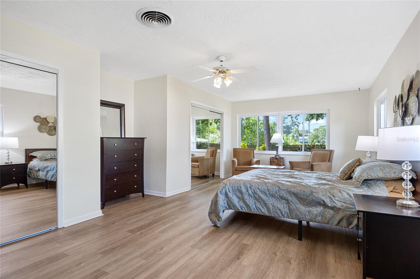 Alternate view in the Master Bedroom.   Two large closets as well as plenty of extra space. Will you have a private seating area?    Workout area?