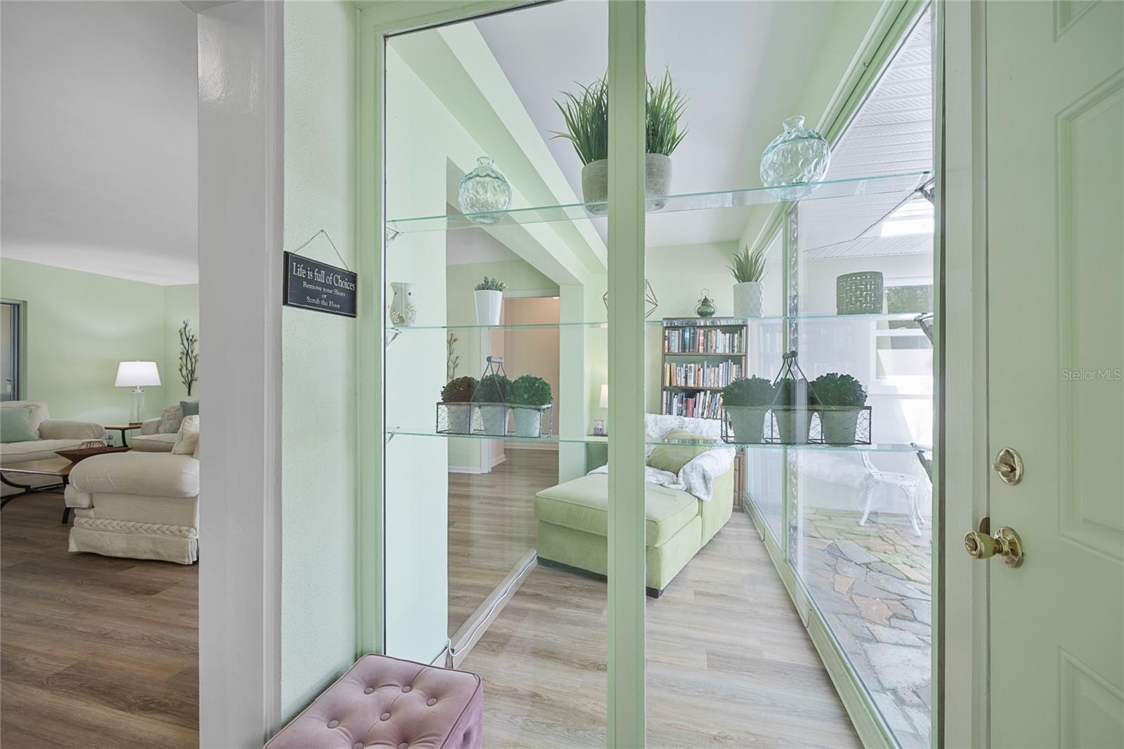 As you enter the home you are welcomed into a bright foyer with a view to the reading nook.